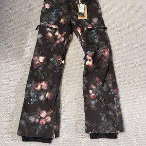 Never worn Burton Black floral ski pants with tags.